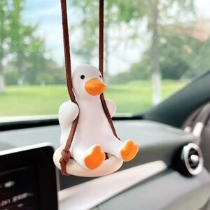 Swinging Duck On a Seat For Christmas Tree or Car Mirror New in Packaging